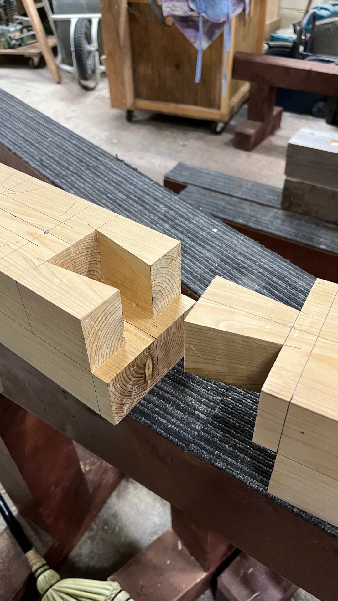 Complex Japanese joinery on a cypress beam